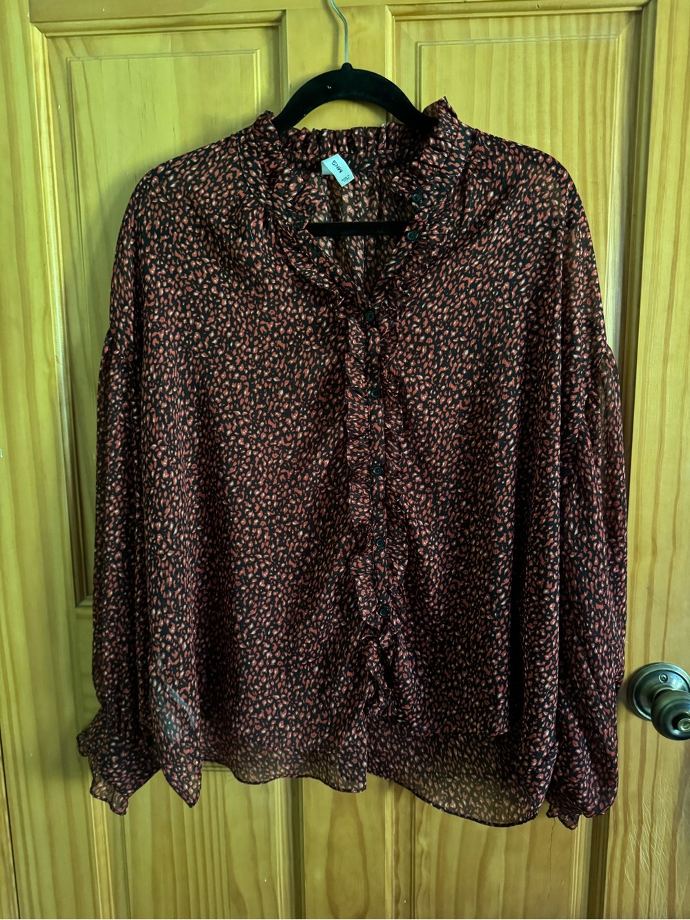 Mango lightweight flowy black and burnt orange top size 4